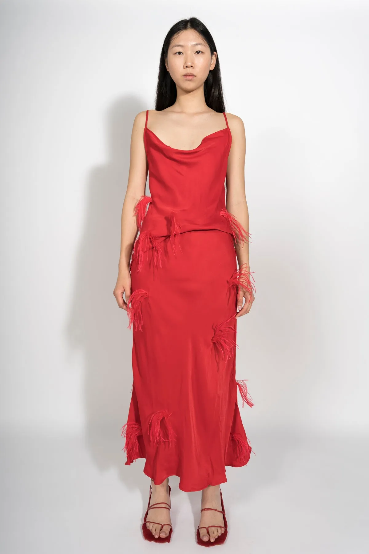 RED SLIP TOP WITH FEATHERS