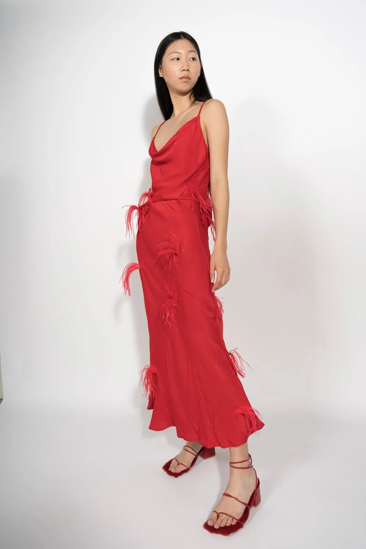 RED SLIP TOP WITH FEATHERS