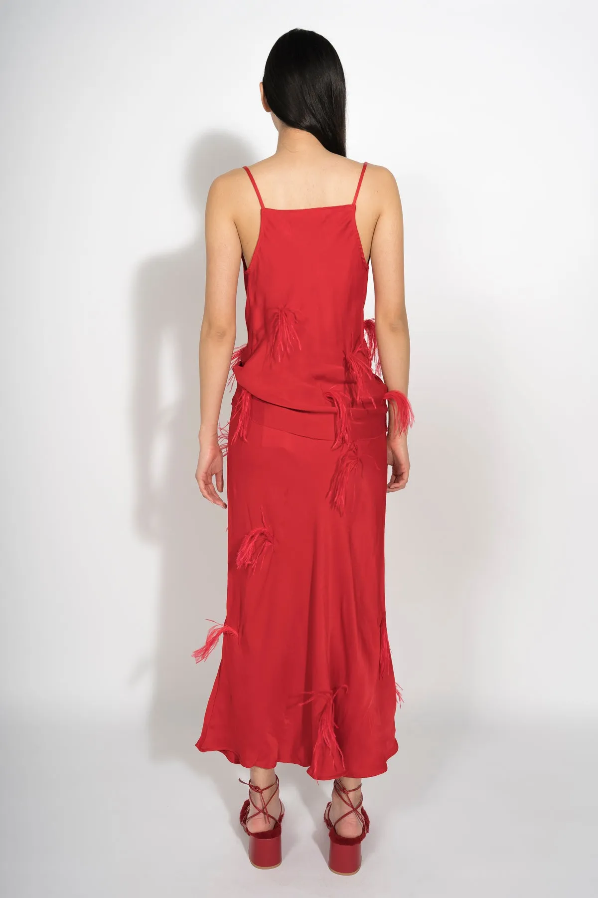 RED SLIP TOP WITH FEATHERS
